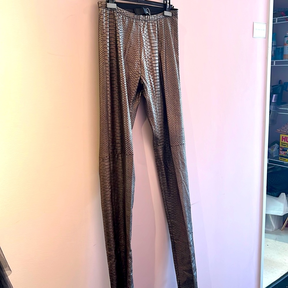 Haider Ackermann silver snake skin pants.
